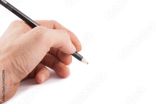 Black pen in a left hand on white background