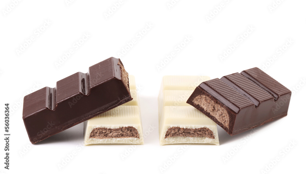 Fototapeta premium Black and white chocolate bars with filling.