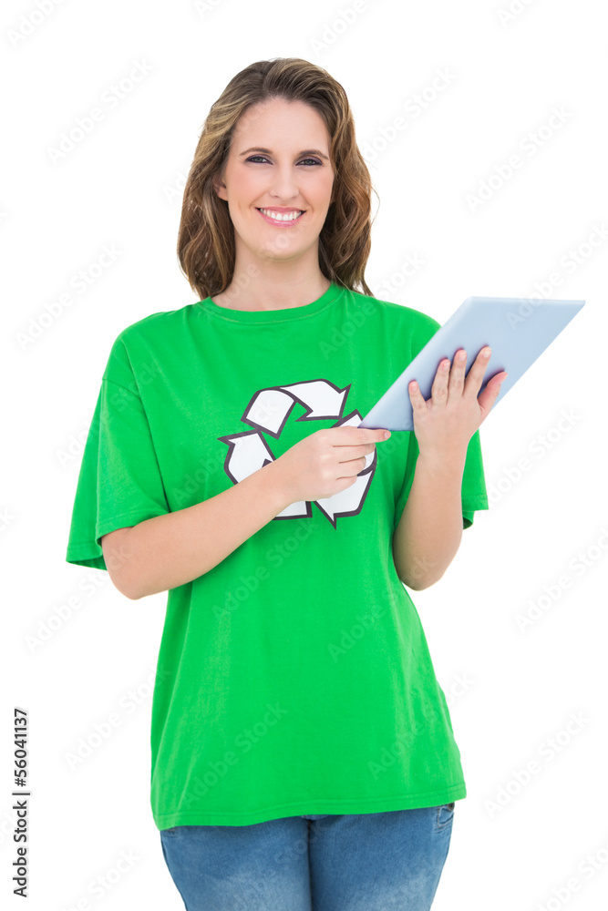 Smiling environmental activist using digital tablet Smiling environmental activist using digital tablet