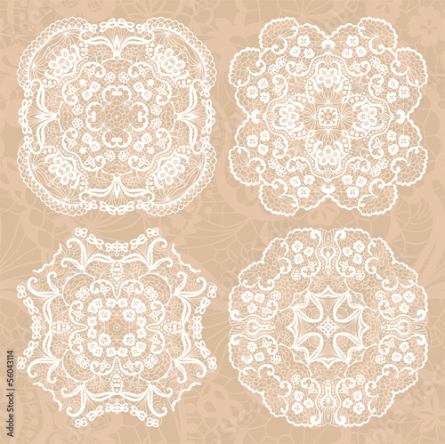 Set of four lace decorative ornaments