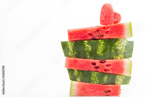Watermelon sliced heart shape on white bacground