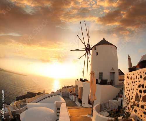 Windmill in Santorini against sunset, Greece