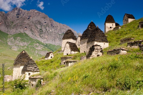 Ruins of ancient settlement in the Caucasus mountains photo
