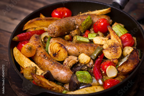 Sausages and vegetables in the pan
