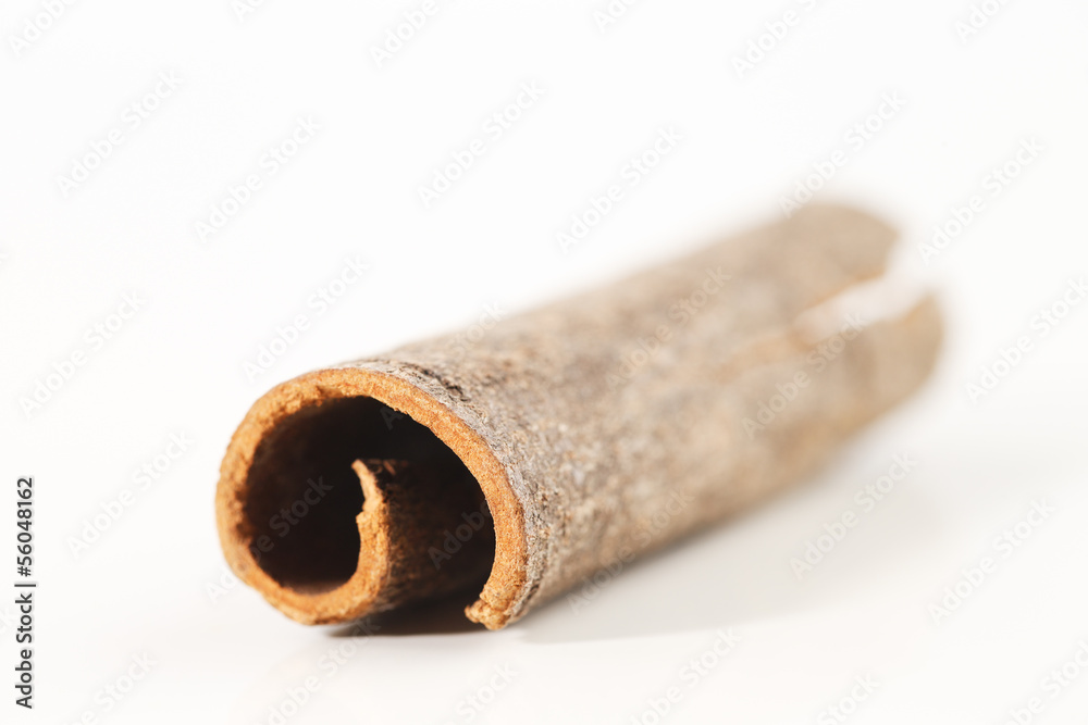 Whole cinnamon sticks against a white background Whole cinnamon sticks against a white background