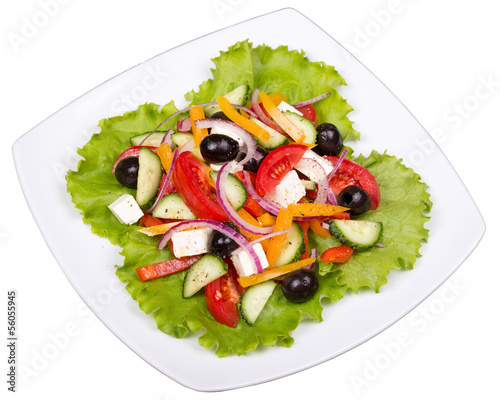 Fresh vegetable greek salad isolated on white background