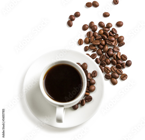 Cup of coffee with a coffee beans around, top view