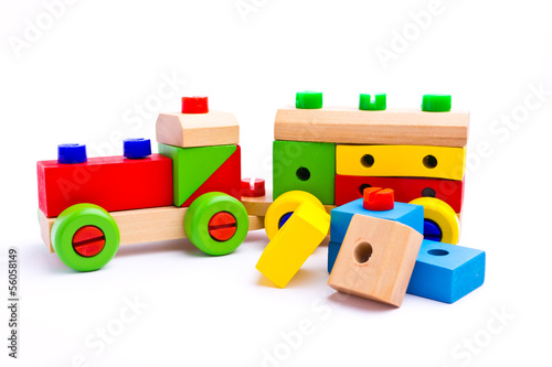 Colorful wooden toy train isolated on white background