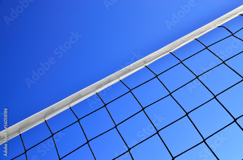Volleyball net on the background of blue sky