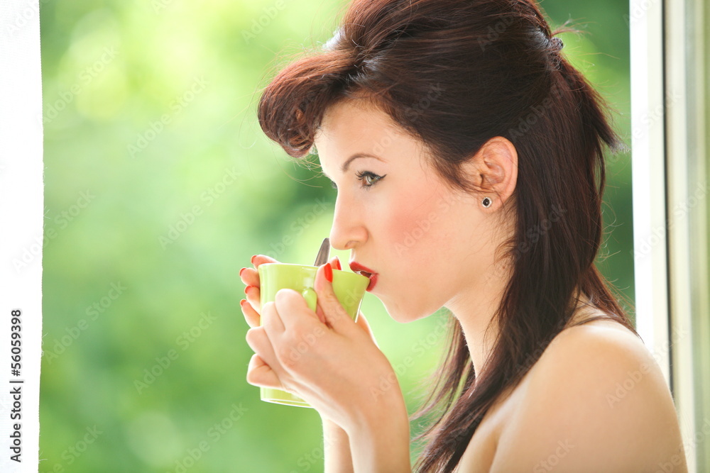 Beautiful Girl Drinking Tea or Coffee Beautiful Girl Drinking Tea or Coffee
