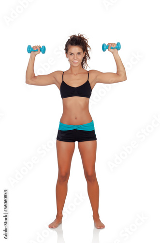 Beautiful woman doing weights to tone her muscles