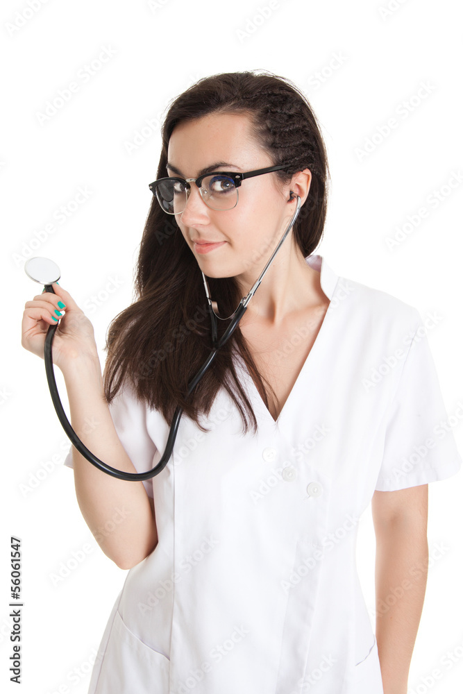 Sexy nurse with stethoscope. female doctor - isolated over a wh Sexy nurse with stethoscope. female doctor - isolated over a wh