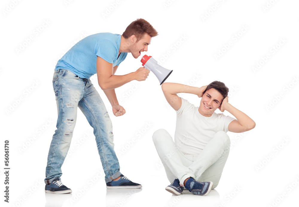 Young men screams to his friend through a megaphone