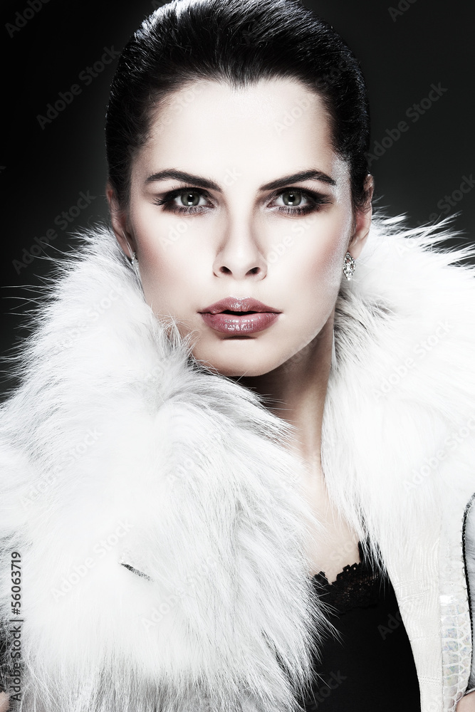 photo of beautiful girl is in fashion style is in fur clothes photo of beautiful girl is in fashion style is in fur clothes