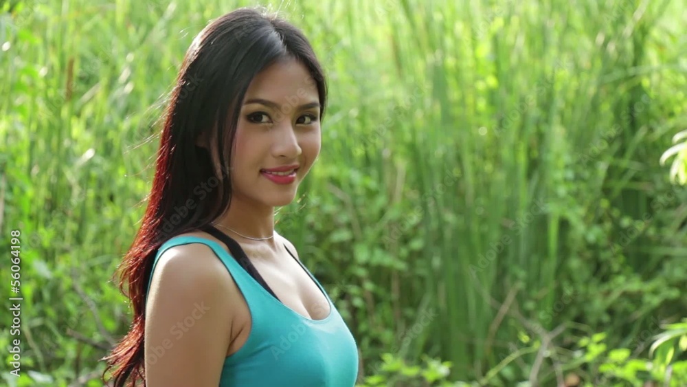 portrait of smiling woman, evening outdoor scene : Tripod HD portrait of smiling woman, evening outdoor scene : Tripod HD