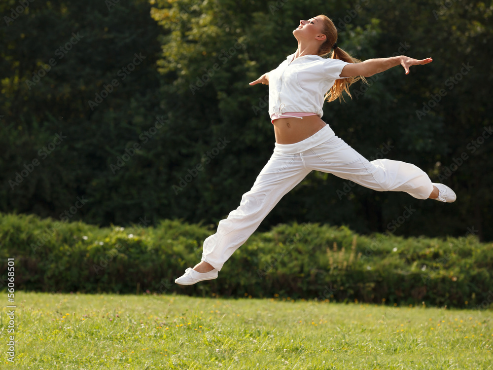 Happy Woman Outdoor. Jumping Girl Feels Free. Freedom concept. Happy Woman Outdoor. Jumping Girl Feels Free. Freedom concept.