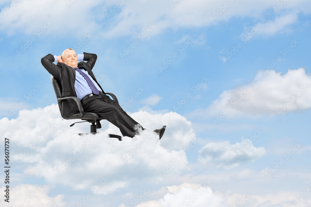 custom made wallpaper toronto digitalMature businessman resting in armchair and floating on a cloud