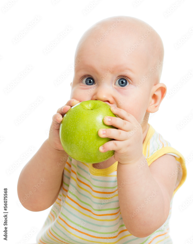 Baby boy eating green apple, isolated on white Baby boy eating green apple, isolated on white