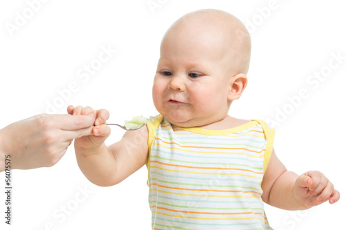 Little baby feeding with a ...