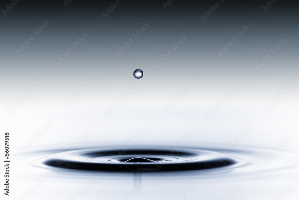splash of water drops on a blue background splash of water drops on a blue background