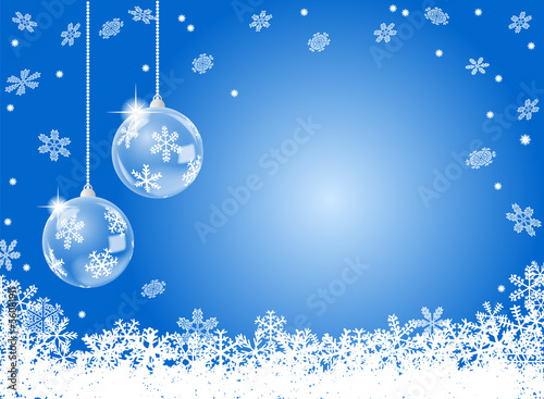 abstract blue snowflake background with two christmas baubles