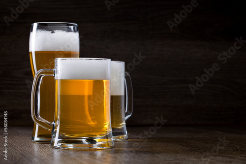 Two glass beer on wooden table