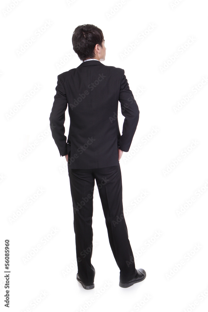 business man from the back looking at something business man from the back looking at something