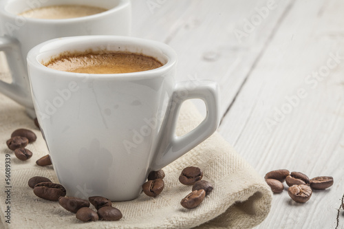 Coffee beans with coffee cup