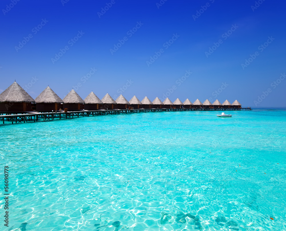 houses on piles on sea. Maldives