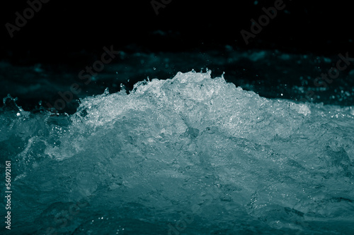rough water on a black background