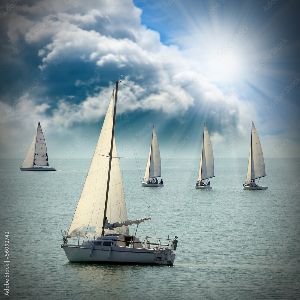 The Sailboats on a sea against a dramatic sky.