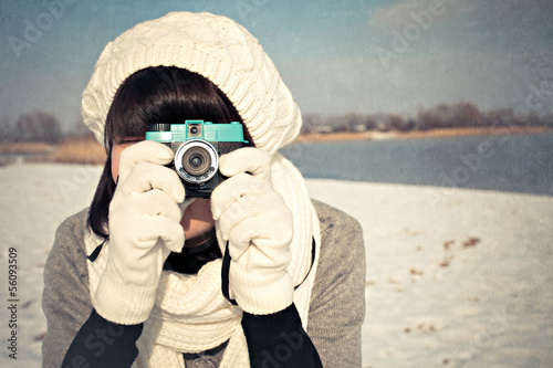 Female photographer in winter