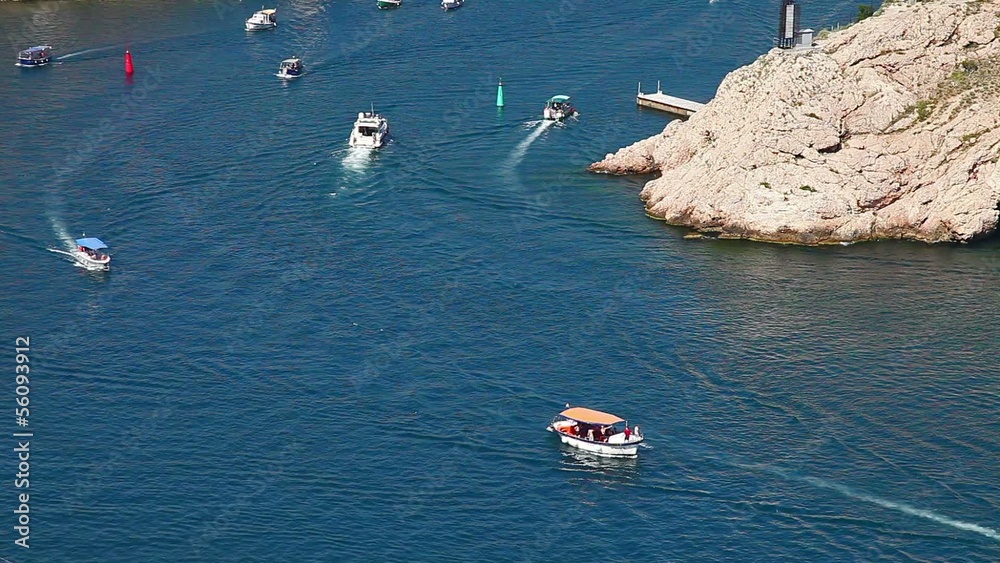Boats floating on the sea coast Boats floating on the sea coast