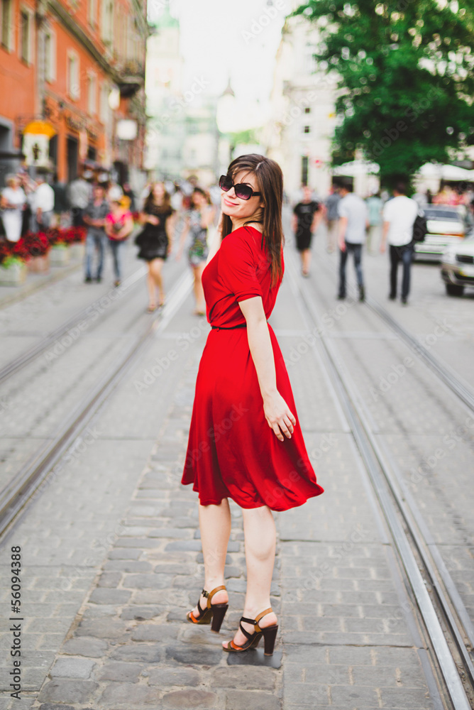 a girl in a red dres