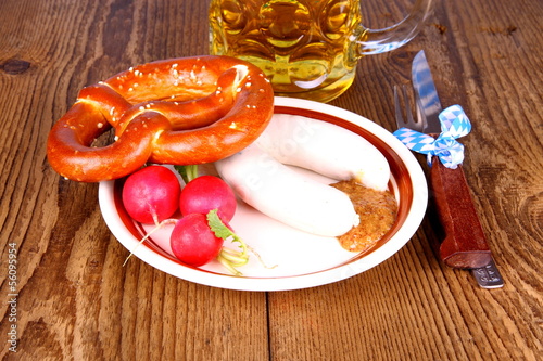 White sausage, pretzel, radish with mustard and beer photo