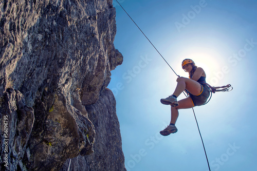 Abseiling woman photo