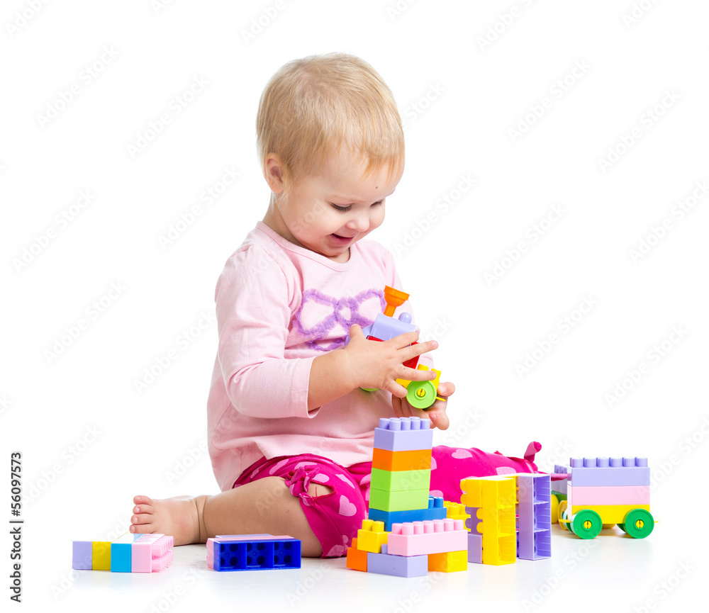 child girl playing with construction set over white background child girl playing with construction set over white background