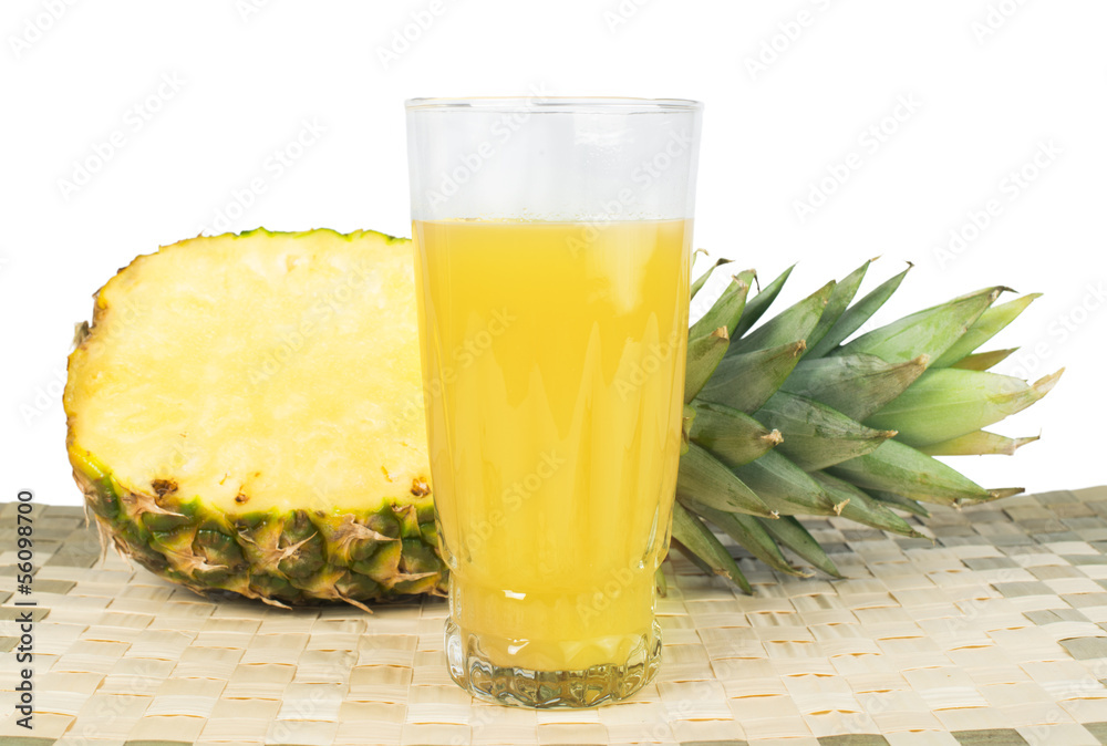 Pineapple and glass of juice Pineapple and glass of juice