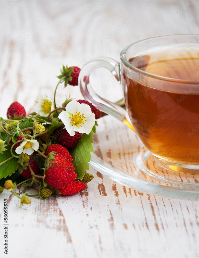 Tea and wild strawberries Tea and wild strawberries