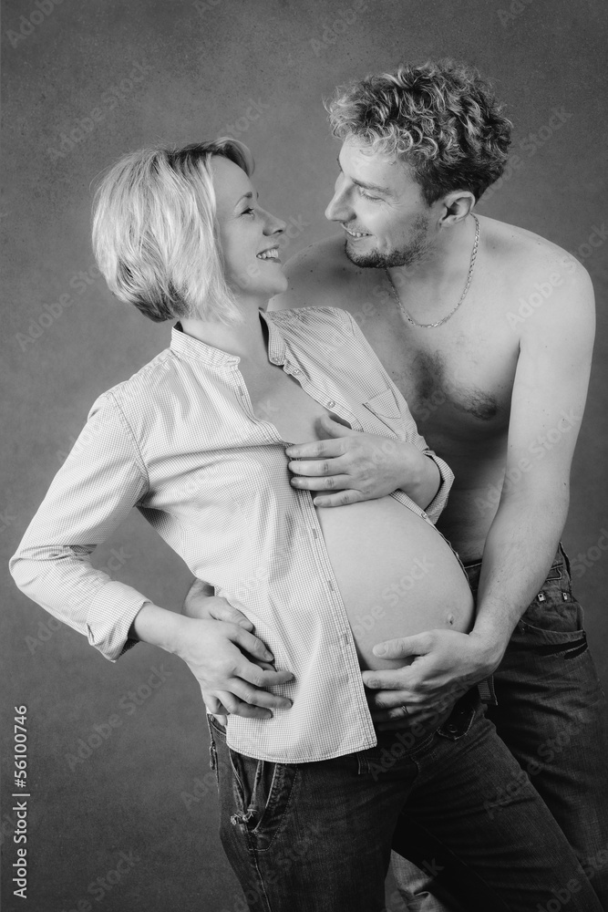Loving happy couple, pregnant woman with her husband