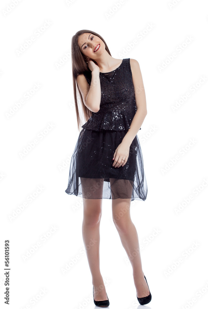 Cheerful girl with long hair posing in black dress Cheerful girl with long hair posing in black dress
