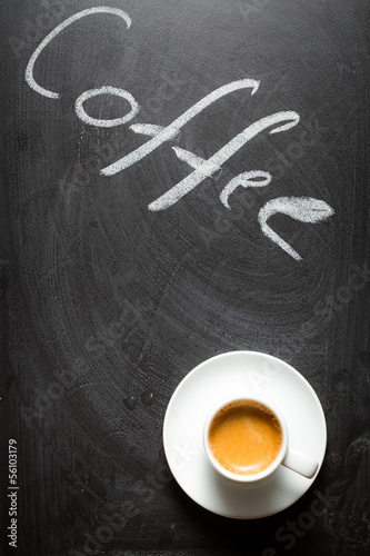 Black chalkboard with the words coffee and espresso