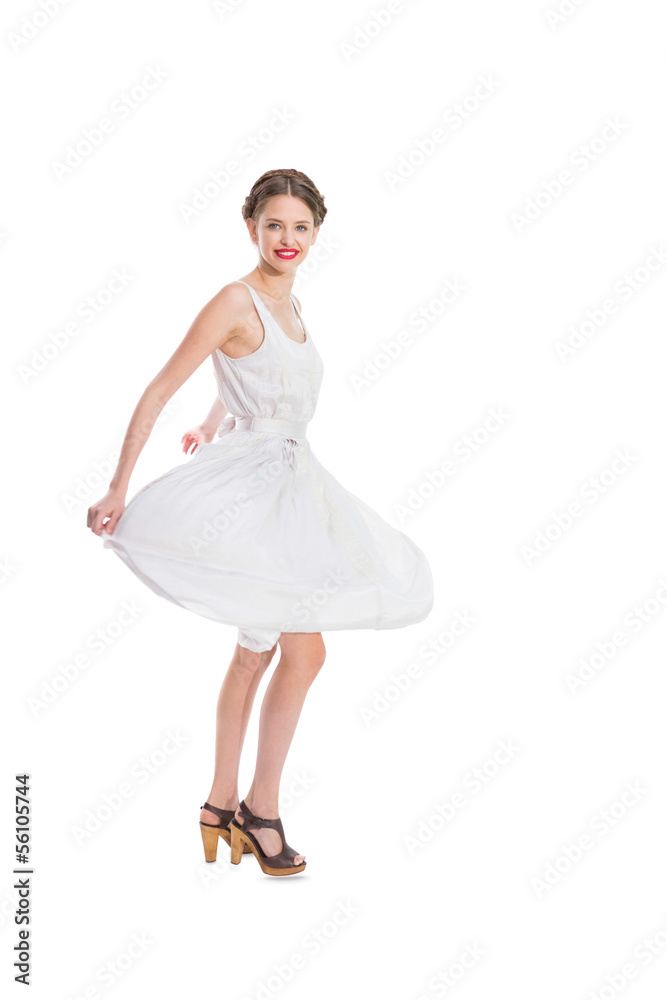 Happy pretty woman in white summer dress posing Happy pretty woman in white summer dress posing