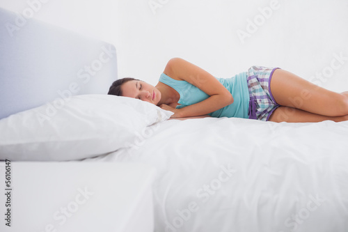 Pretty woman lying in bed