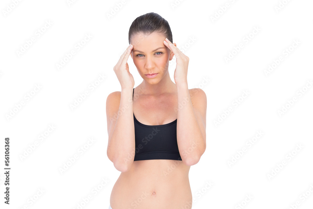 Fit athlete suffering from headache Fit athlete suffering from headache