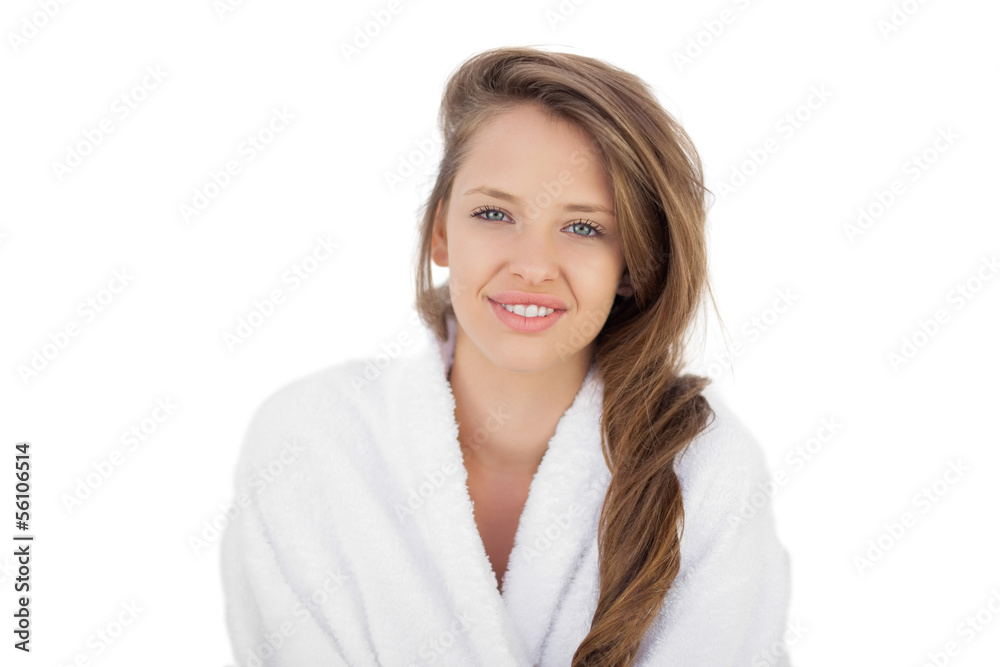 Delighted brunette in bathrobe looking at camera Delighted brunette in bathrobe looking at camera