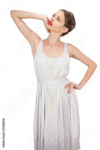 Sensual model in white dress posing looking away © WavebreakMediaMicro