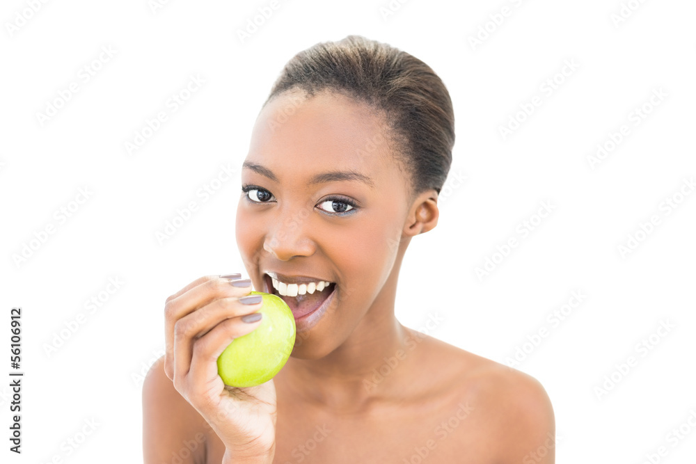 Cheerful natural beauty biting green apple Cheerful natural beauty biting green apple