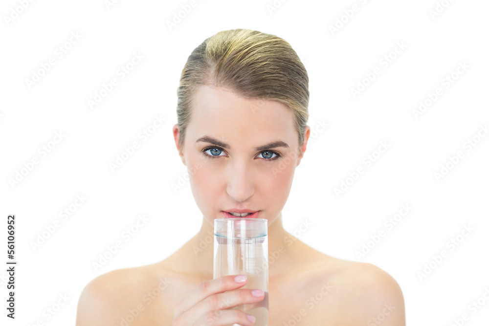 Content attractive blonde drinking water Content attractive blonde drinking water