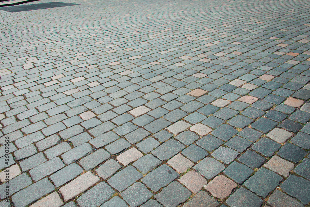 Fototapeta premium Old road paved with the cobble stones